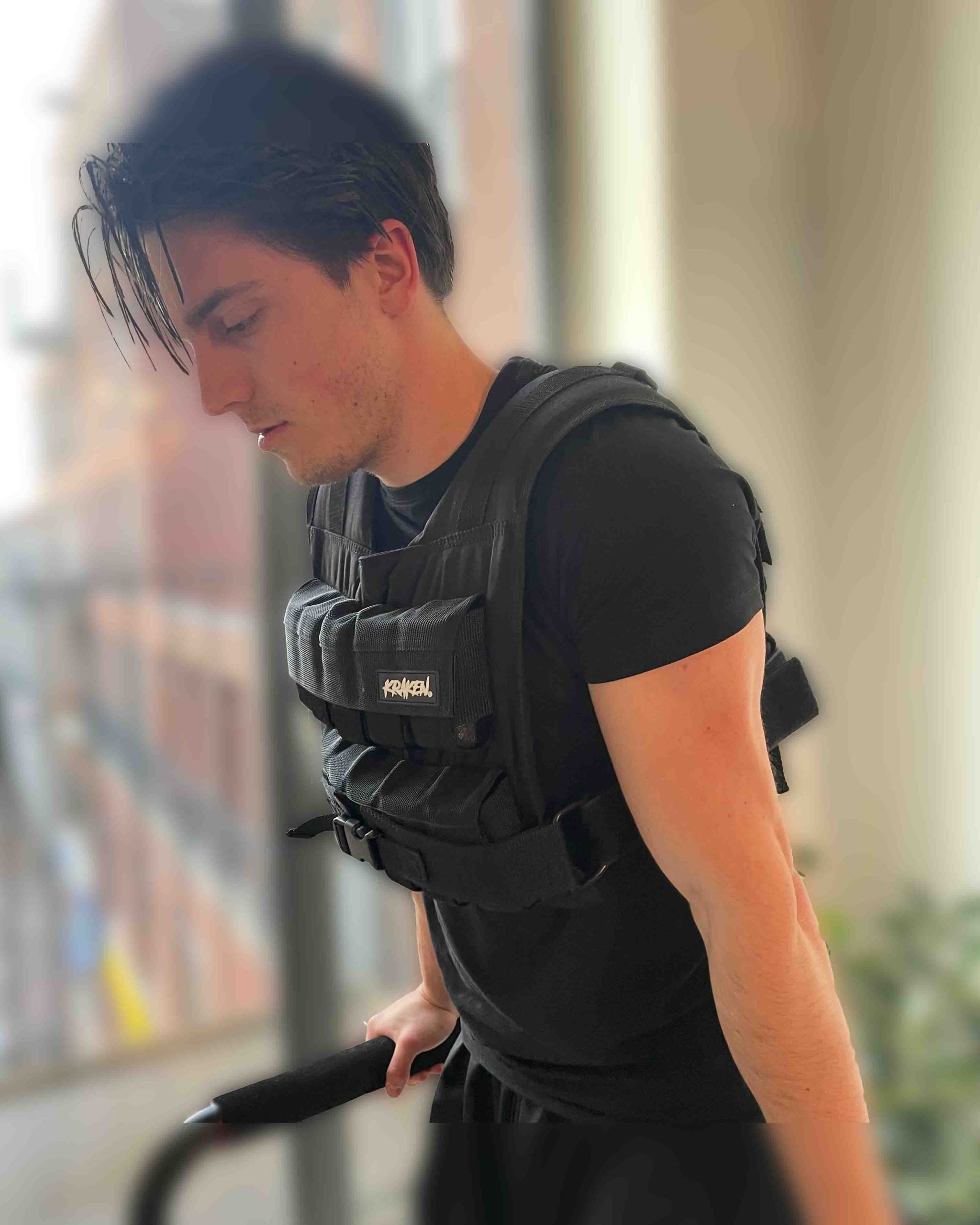 Athlete performing dips in the KRAKEN Weight Vest 20 KG